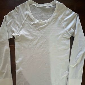 Women’s lululemon long sleeve white swiftly tech size 4